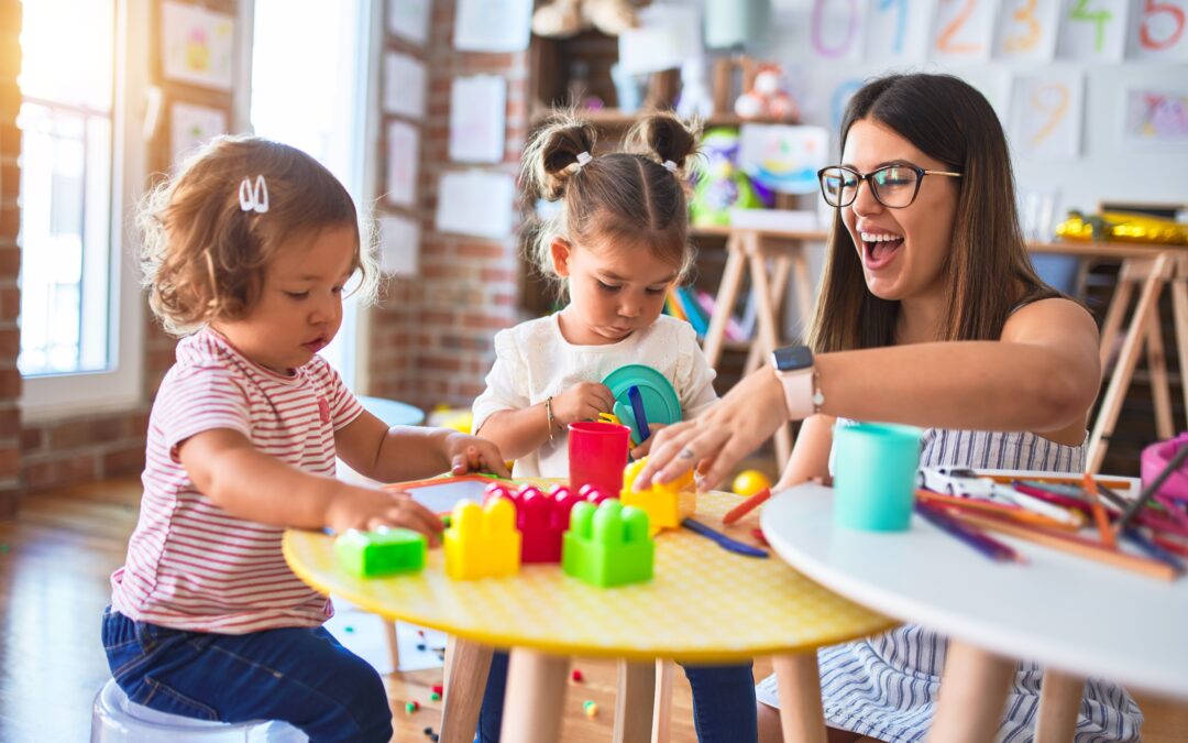 kids and teacher playing