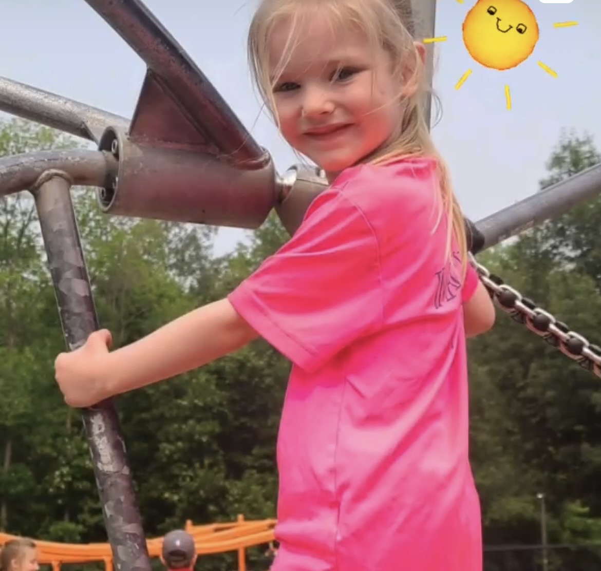 CKA SA Summer 6 young girl on playground equipment