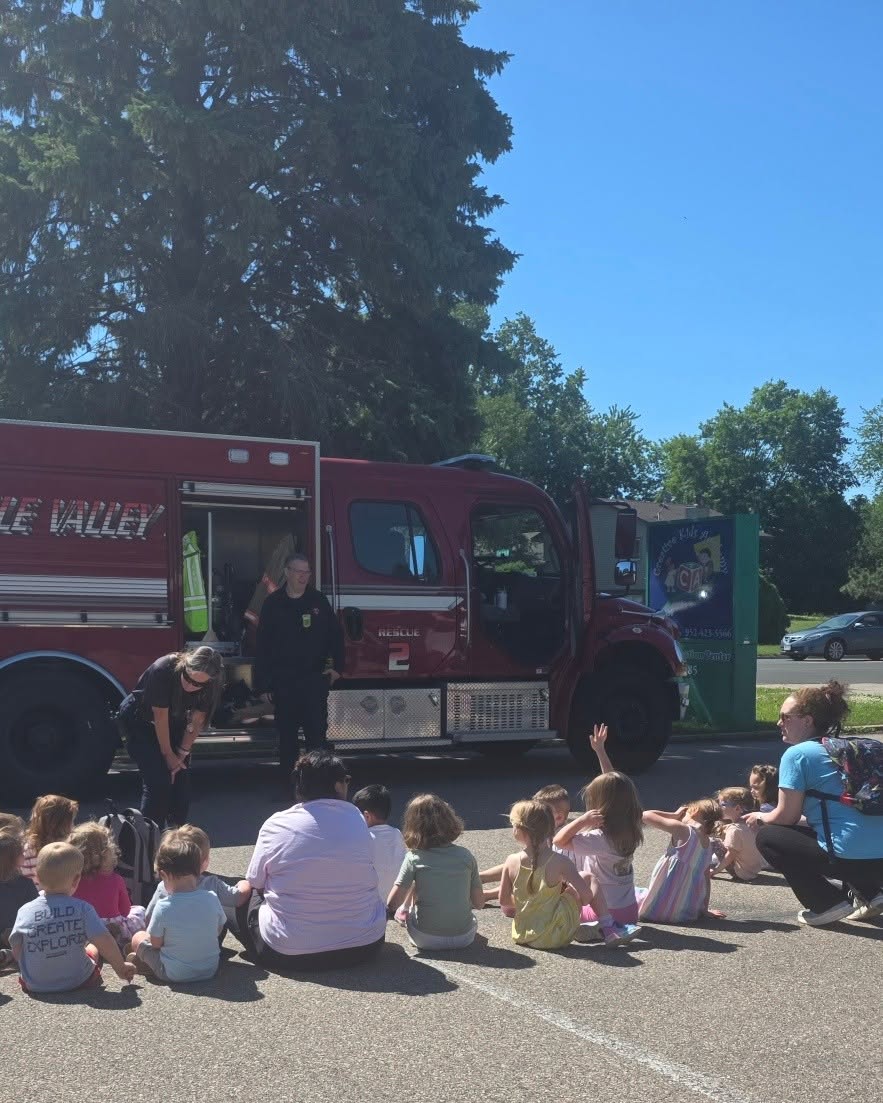Apple Valley firefighters visiting the children