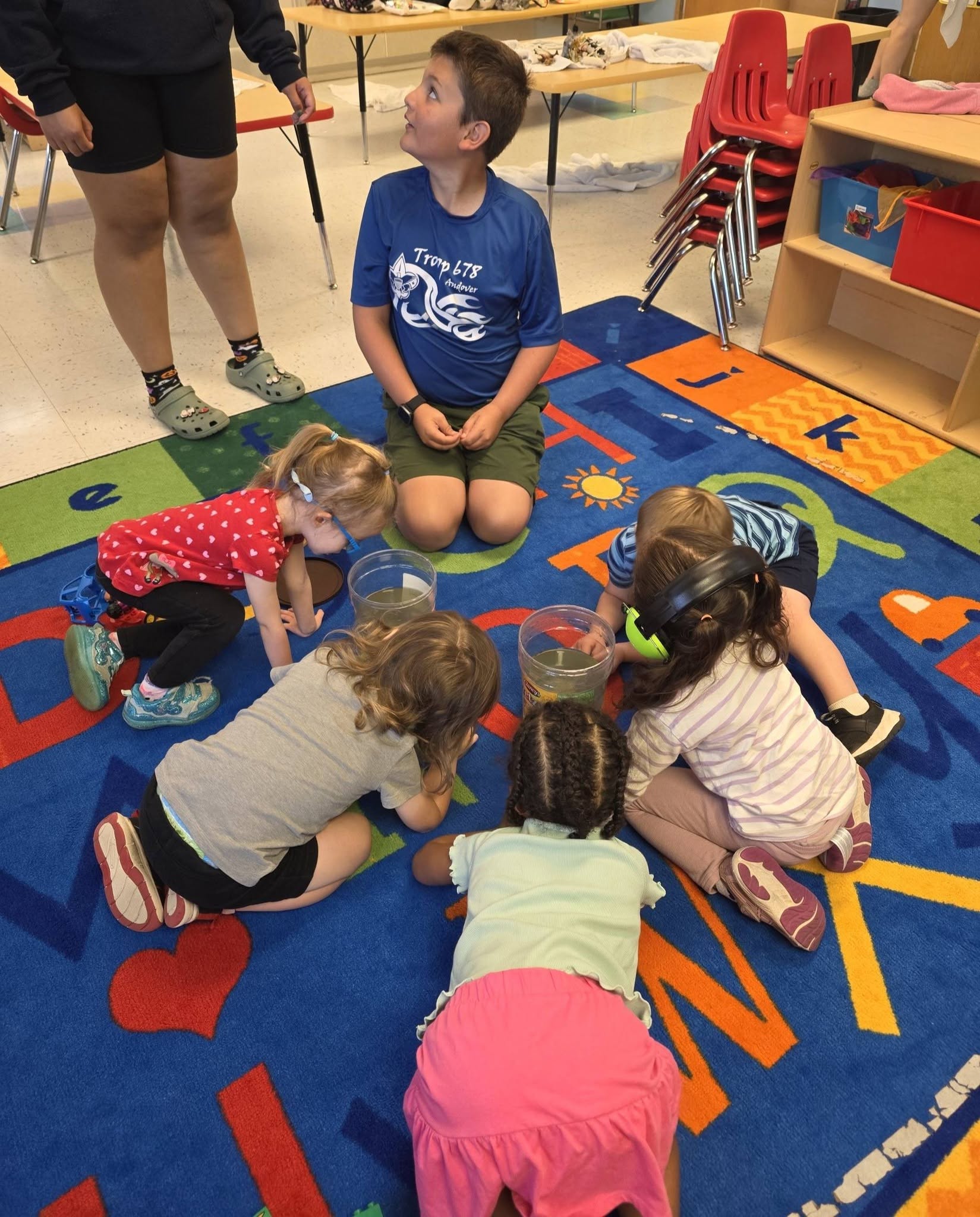 Children gathered for a hands-on science activity