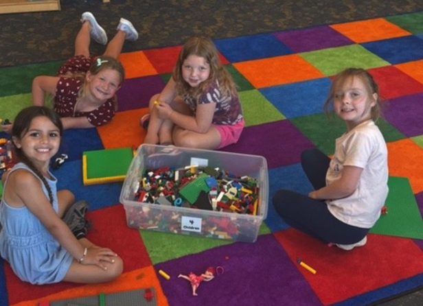 Children building with Legos