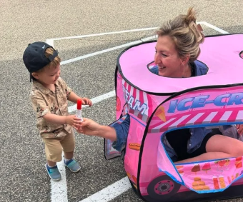 Children visiting the ice cream truck at a CKA summer event