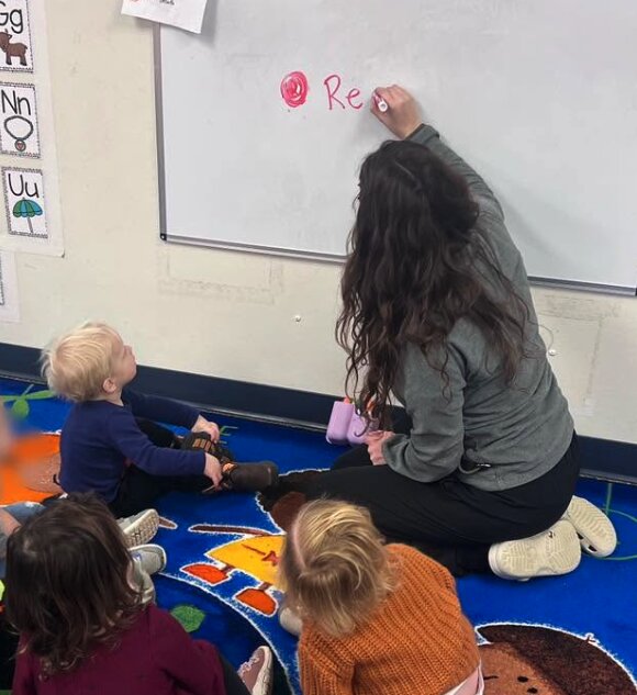 Toddler learning at the whiteboard
