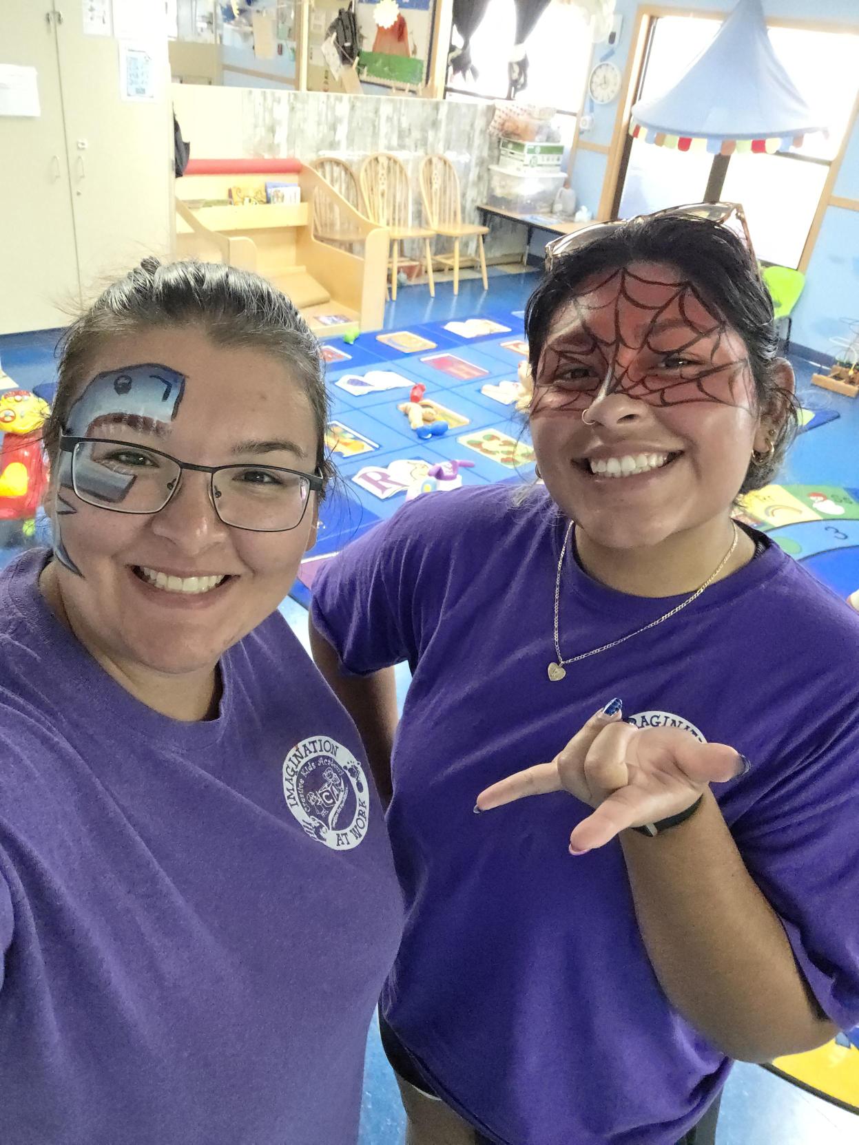 CKA staff member with face paint at a center celebration