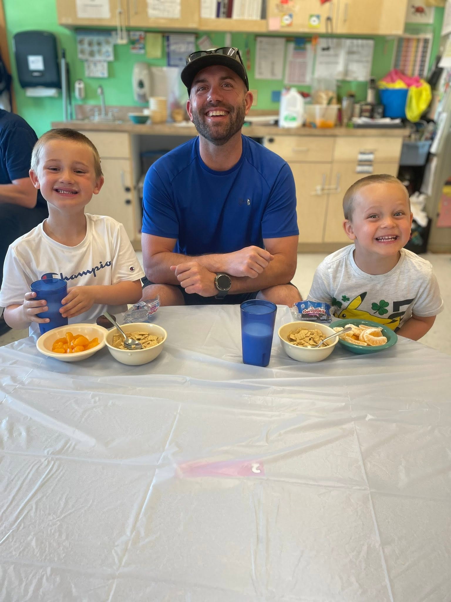 A family enjoying breakfast together at Creative Kids Academy Lexington