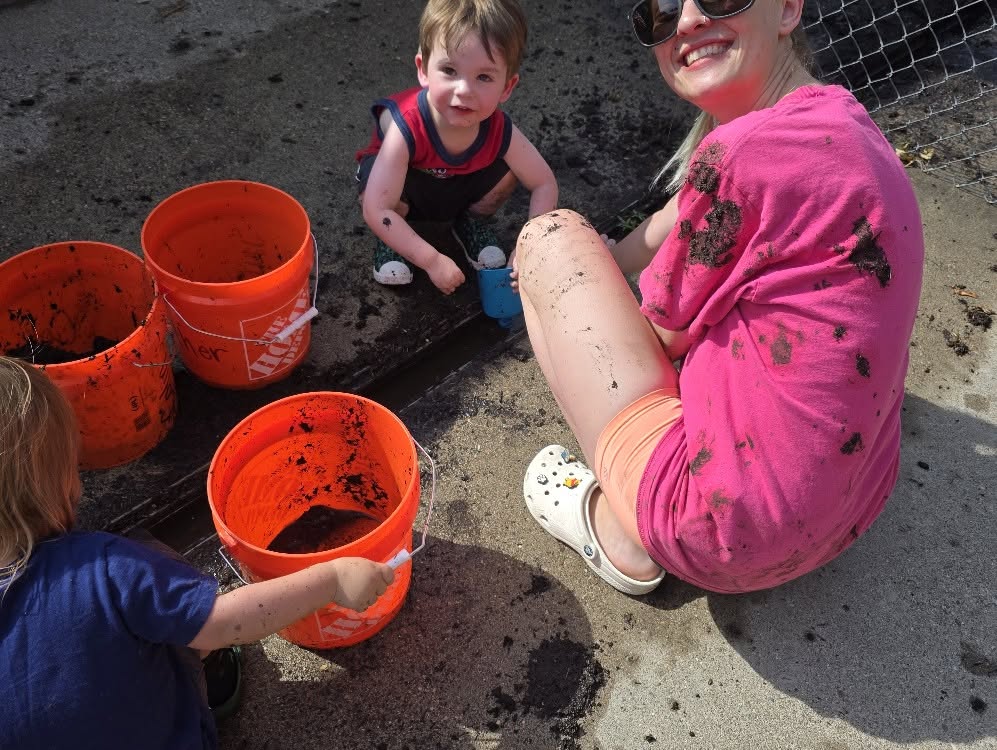 Children playing with water outside
