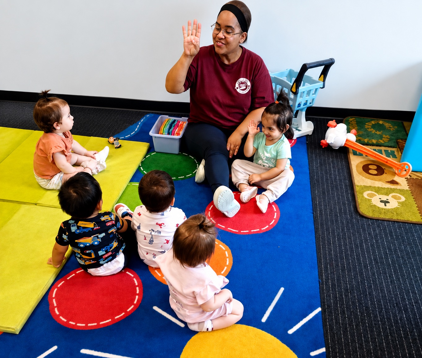 Emerging toddlers gathered together during group time