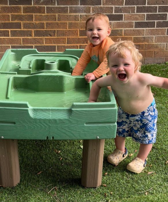 Little ones enjoying the water table